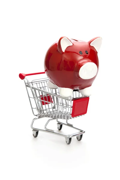 Carrito de compras y alcancía roja — Foto de Stock