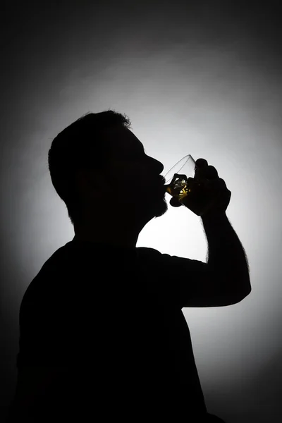 Man drinking Whisky Stock Picture