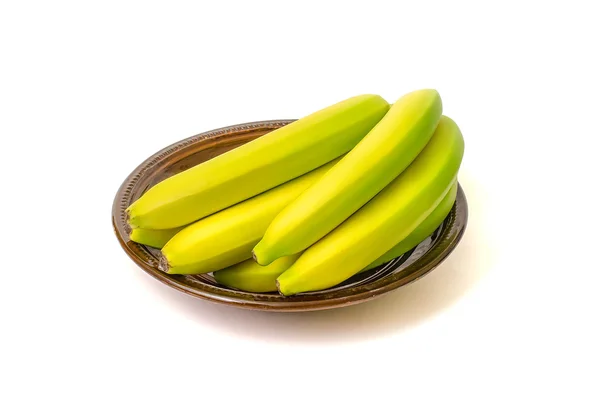 Bananas on the dish on white background — Stock Photo, Image