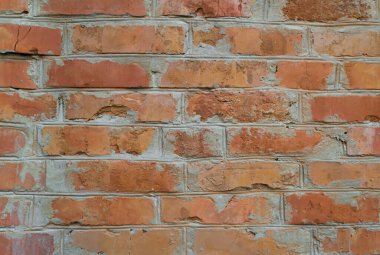 Eski kırmızı tuğla. Arkaplan olarak tuğla duvar