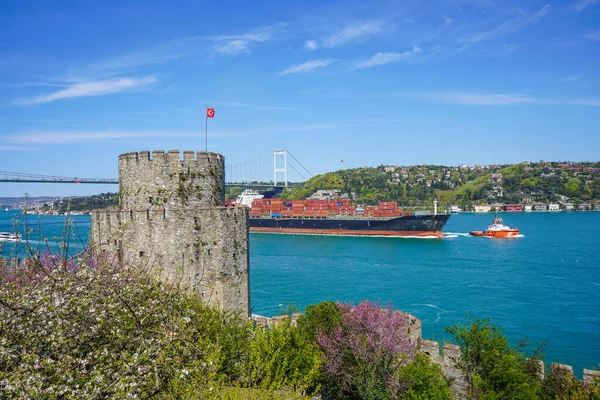 Sea transportation, Bosphorus. Rumelihisari, Rumelian Castle, Roumeli Hissar Castle, is a medieval fortress, Istanbul, Turkey. View of Fatih Sultan Bridge or Second Bosphorus Bridge.