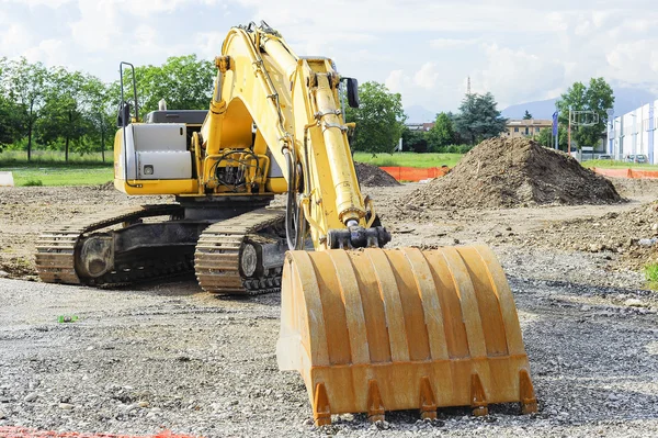 Excavadora excavadora en el sitio de construcción . — Foto de Stock