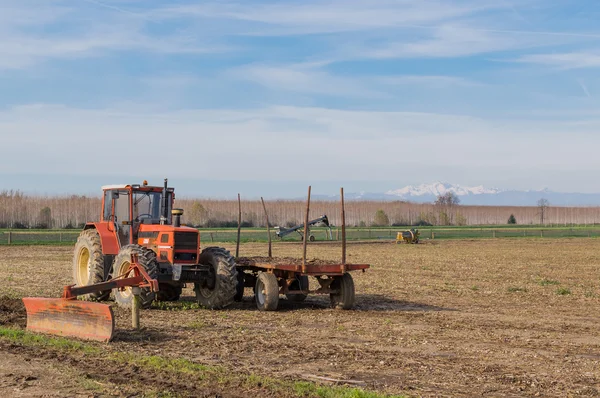 Agricultural Landscape with farm tools — Stock Photo, Image