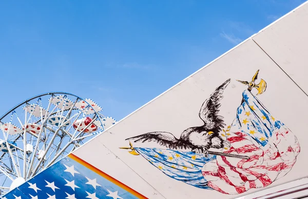 Symbols of the USA flag and Ferris wheel — Stock Photo, Image