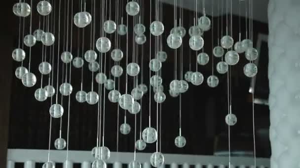 Lights of modern chandelier. Lighting decor. Chandelier close up. Steadicam shot — Stock Video
