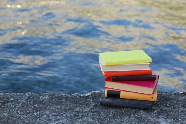 A bunch of books to read on the beach by the sea