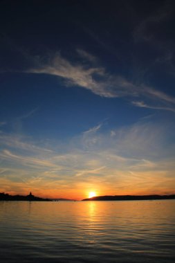 Sunset over the sea in Croatia clipart