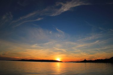 Hırvatistan 'da deniz üzerinde gün batımı