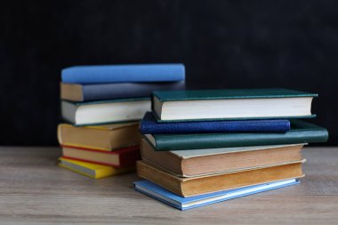 stack of books on wooden background, AI