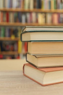 stack of books on wooden background, AI