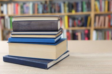 books with a stack of books on the table