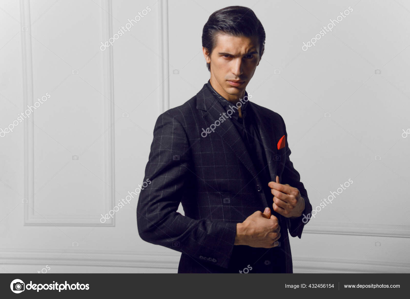 Contemplative Young Man in Stylish Striped Suit and Silk Scarf | MUSE AI