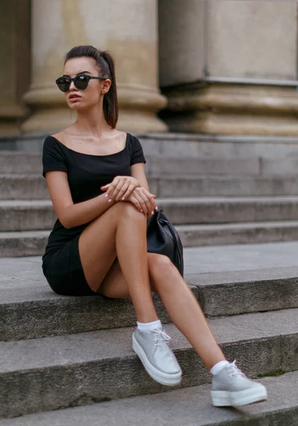 Beautiful Young Woman Sitting Stairs Sunglasses Woman Black Slim Dress — 图库照片