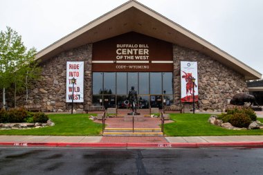 Cody, Wyoming, USA, May 23, 2021: front entrance of the Buffalo Bill Center of the West, that holds 5 museums, horizontal clipart