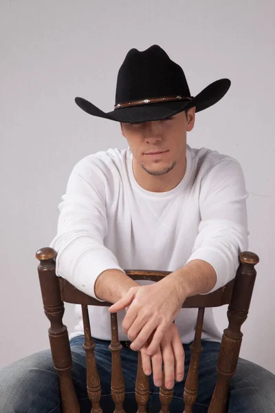 Pensive Cowboy Sitting Relaxed — Foto de Stock