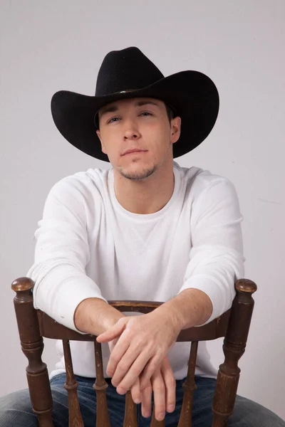 Pensive Cowboy Sitting Relaxed — Stock fotografie