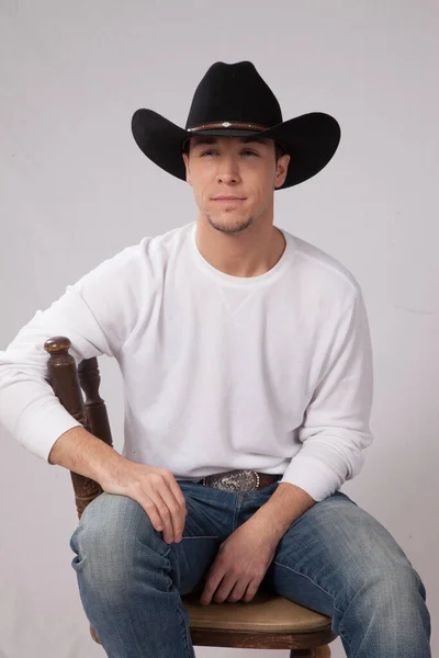 Happy man in a black cowboy hat