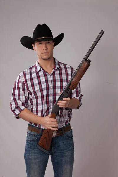 Töprengő Cowboy Kezében Egy Shotgun — Stock Fotó