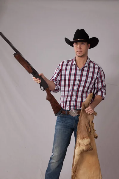 Töprengő Cowboy Kezében Egy Shotgun — Stock Fotó