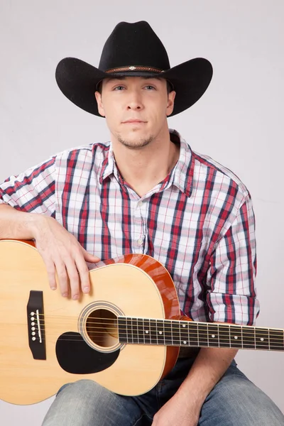 Thoughtful Cowboy Guitar —  Fotos de Stock