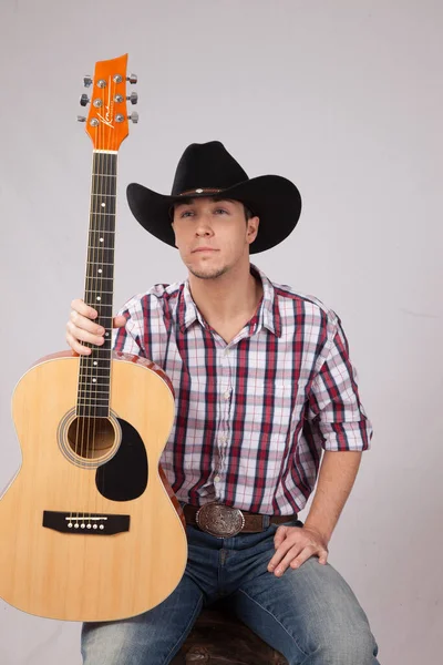 Thoughtful Cowboy Guitar —  Fotos de Stock