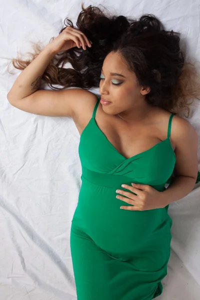 Lovely Pregnant Woman Laying Stock Picture