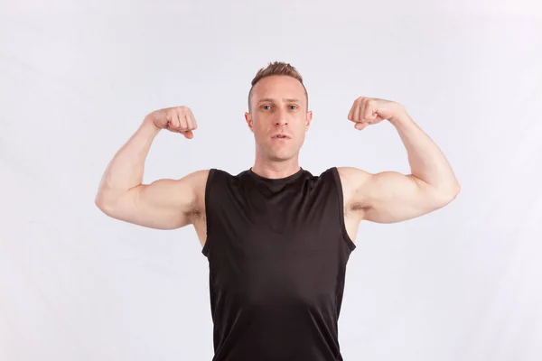 Handsome Man Flexing His Muscles — Stock Photo, Image