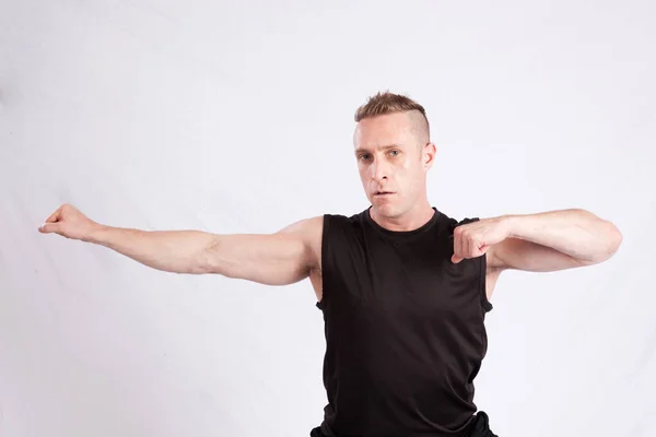 Handsome Man Stretching His Muscles — Stock Photo, Image