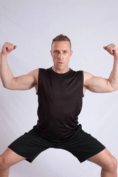 Handsome Man Stretching His Muscles — Stock Photo, Image