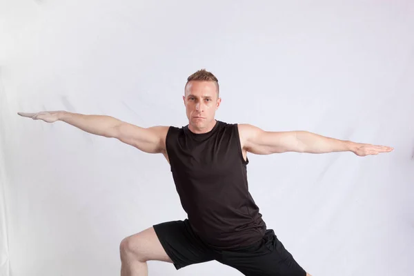 Handsome Man Stretching His Muscles — Stock Photo, Image