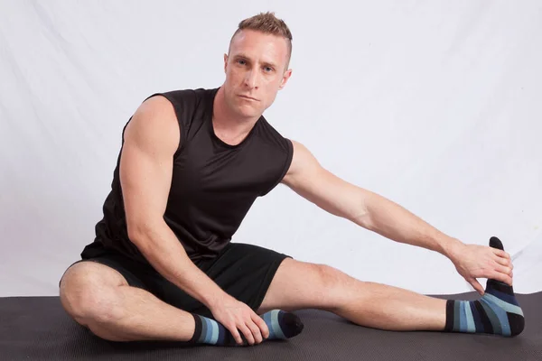 Handsome Man Stretching His Muscles — Stock Photo, Image