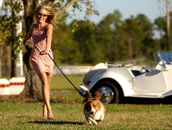 Professional Blonde Model Poses In Front of a Cool Car in a Pretty Dress — Stock Photo, Image