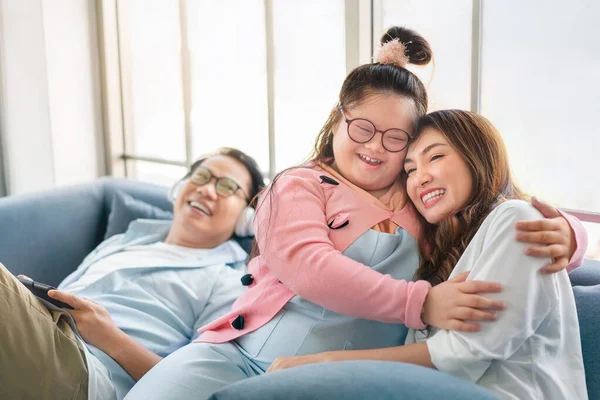 Happy Asian Family Daughter Syndrome Child Sitting Sofa Girl Hug — Fotografia de Stock