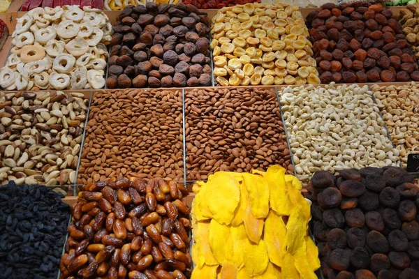 Eastern market. Healthy natural food products. Nuts, dried fruits. Dates, mangoes, nuts