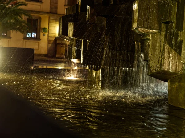 A fountain with frozen water at night in fulda germany — Stock Photo, Image