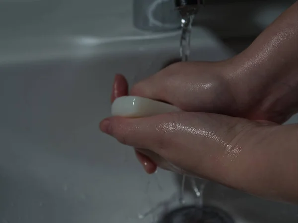 Hygiene prevention protection in jena against virus, bacteria, flu and coronavirus, covid-19 disease by washing hands with soap — Stock Photo, Image