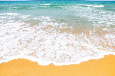 beautiful sandy beach and soft blue ocean wave, Blue ocean wave on sandy beach