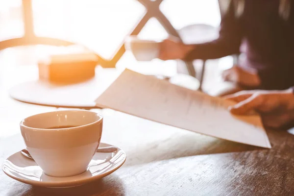 stock image The cup of coffee on the restaurant table