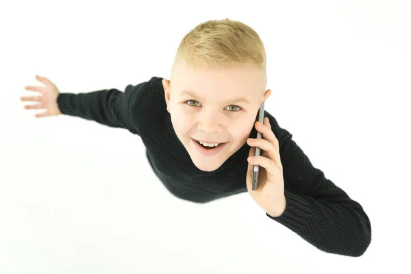 Usmívající Chlapec Telefon Bílém Pozadí Pohled Shora — Stock fotografie