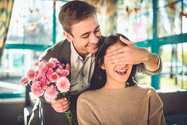 Happy Man Make Surprise Flowers Woman Restaurant — Stock Photo, Image