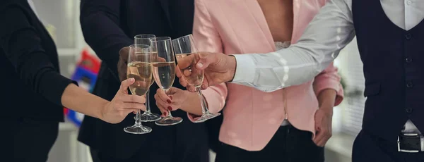 Four Business People Drinking Champagne — Stock Photo, Image