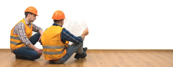 Two Engineers Paper Sit Floor White Wall Background — Stock Photo, Image