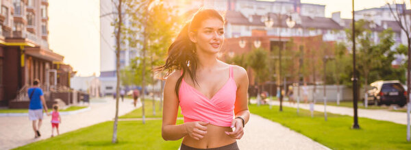 The sportswoman running in the residential complex