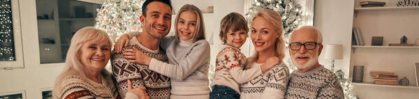 Happy Family Standing Christmas Tree Royalty Free Stock Images