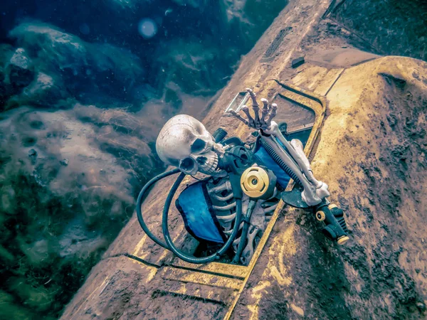 Taş ocağının dibinde dalış takımları içinde iskelet.