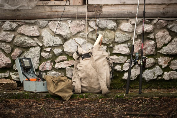 Fishing rods and a backpack for vacation — Stock Photo, Image