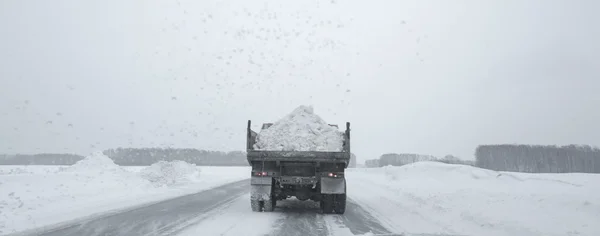 Truck KAMAZ carrying the snow — Stock Photo, Image