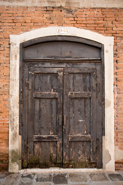 The door to the building. Venice. Photo for you