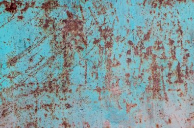 Eski, kirli, paslı ve ağır tırmalanmış metal bir levhanın dokusu bir zamanlar mavi boya ile kaplıydı.