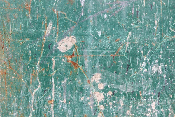 Eski, kirli, paslı ve ağır tırmalanmış bir metal levhanın dokusu bir zamanlar mavi-yeşil boyayla kaplıydı.